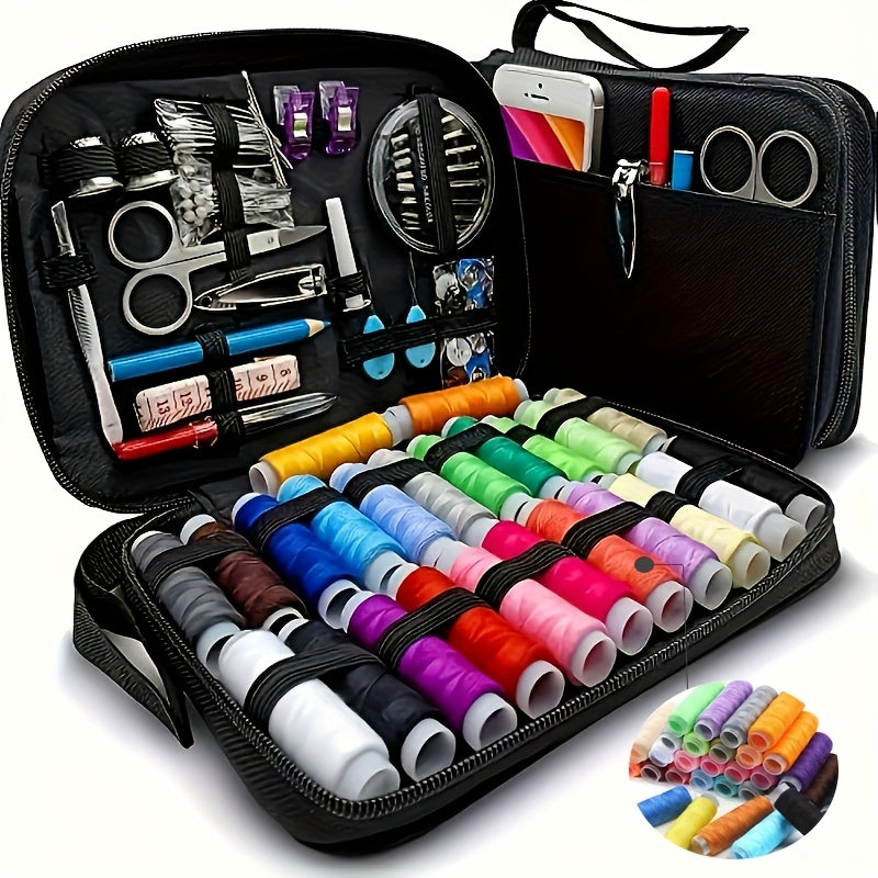 The sewing kit open with thread spools, scissors and accessories