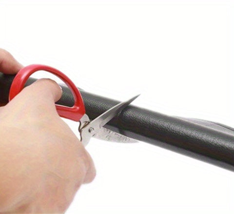 The seal being cut to width with scissors