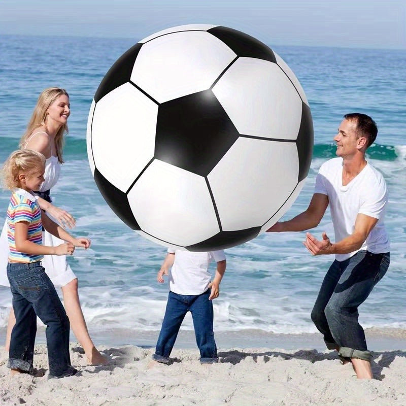 The giant football in the air at the beach