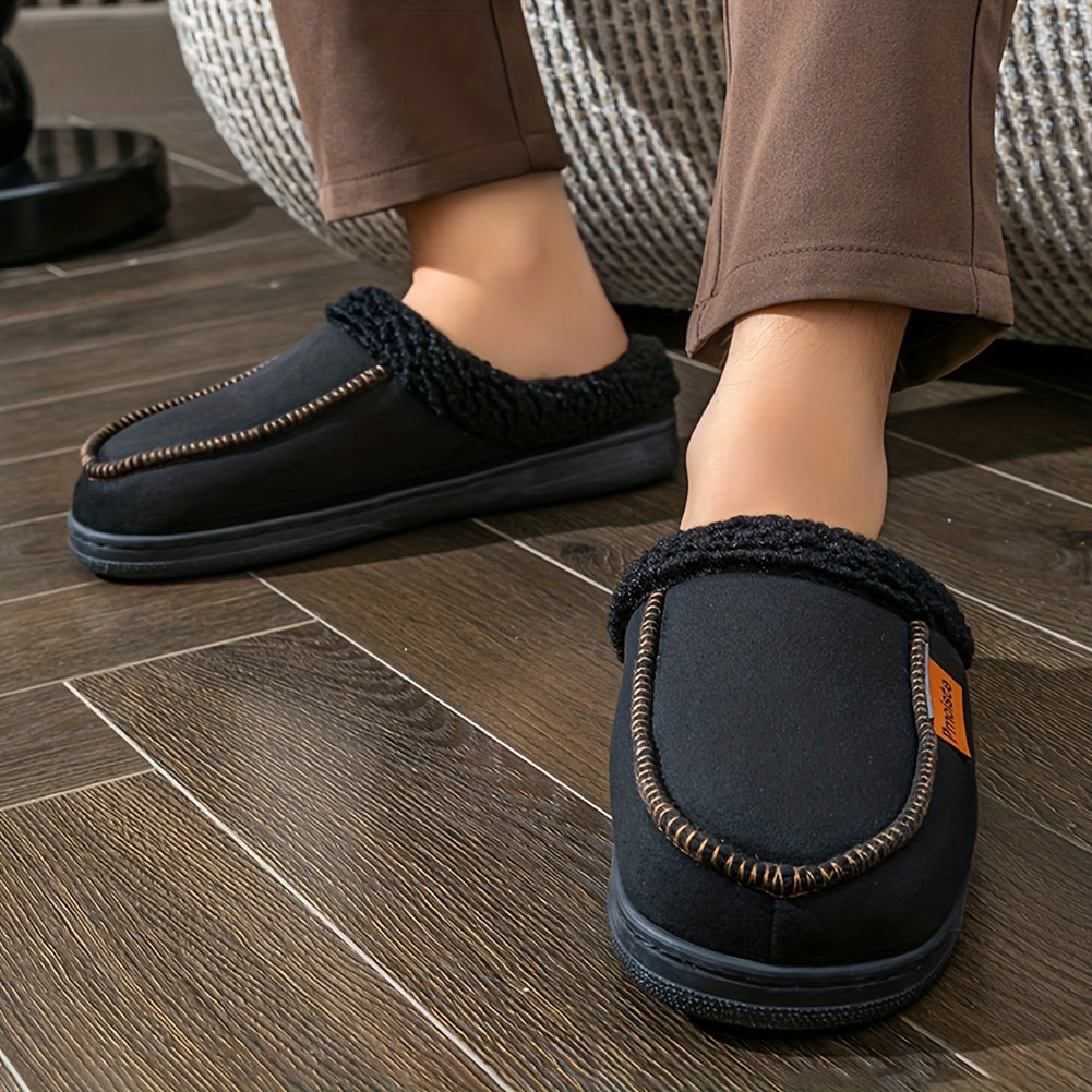 The slippers on feet by the sofa
